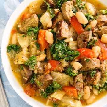 White bean and kale stew with fennel and vegan sausage